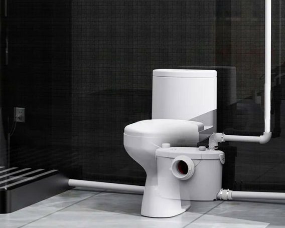 Macerator behind toilet A new or replacement Saniflo, Uniflo or Grundfos solo lift macerator installed